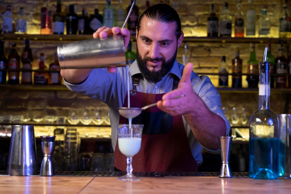 bartender mixing a drink