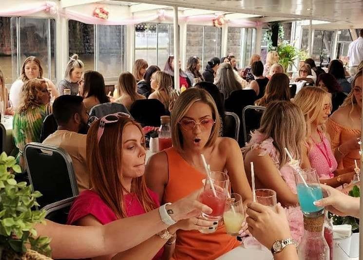 Busy people eating in a boat cruise